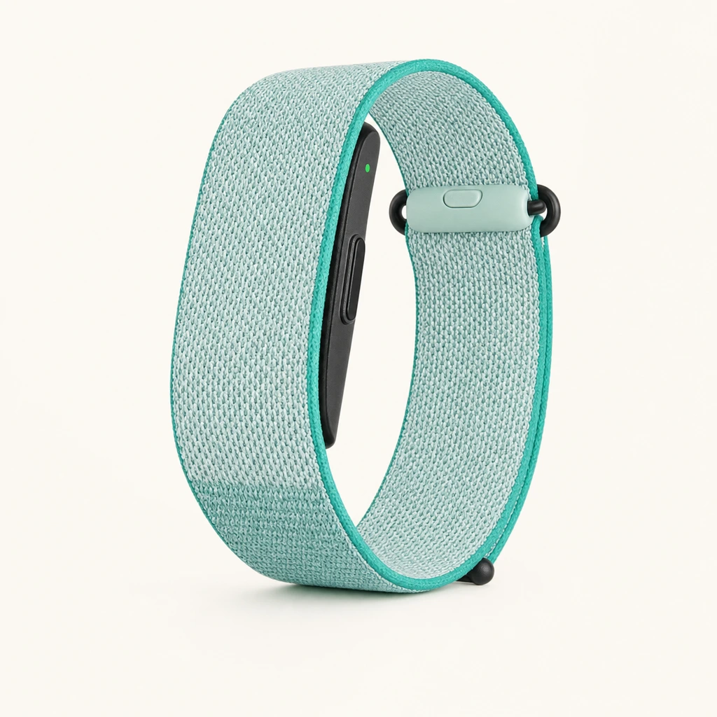 Mint woven LUMI band with a slim sensor module and a matching safety clasp. Concept rendering.